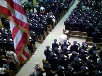 Fellow Officers from as far as Philadelphia fill the church for Police Officer Melvin Santiago's funeral