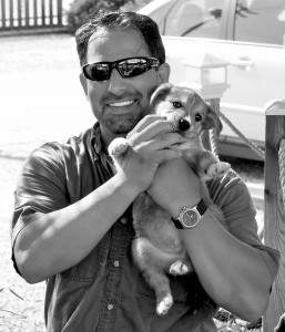 Joe Frazz with one of his favorite photography subjects: Dogs
