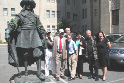 Cliff Perkins, Jersey City Mayor Jerramiah Healy, Jersey City Council President Peter Brennan, and Maryanne Kelleher (far right) and others greet  the Peter Stuyvesant statue at the Beacon Condo's in Jersey City on Friday, August 13th 