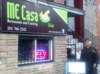 Chef Ed Coto Jr. in front of his restaurant Me Casa