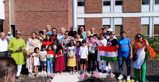 India flag raising standing proud in front of Bayonne's City Hall
